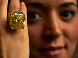    Sotheby’s       100,09    13     14,5    (16,3  )   