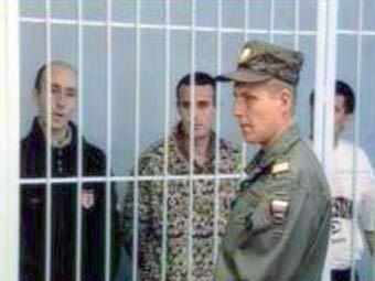 Обвиняемые в зале суда Нижневартовска, кадр Первого канала с сайта 1tv.ru 