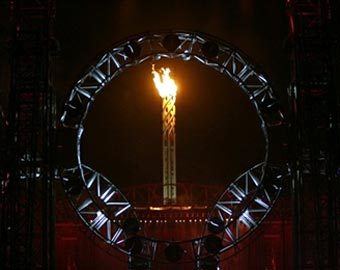 Олимпийский огонь на стадионе "Олимпико". Фото AFP