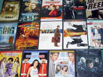    dvdsbydayz.zoomshare.com