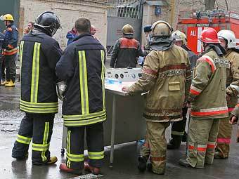 Пожарные. Фото Александра Котомина, Lenta.ru