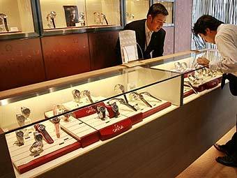  Swatch  .  AFP